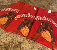 three red t - shirts with a rottweiler on them
